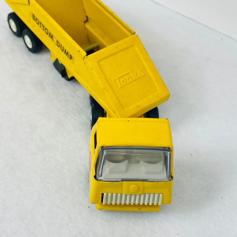 Vintage Tonka Bottom Dump Truck Yellow Pressed Steel Toy Construction Vehicle